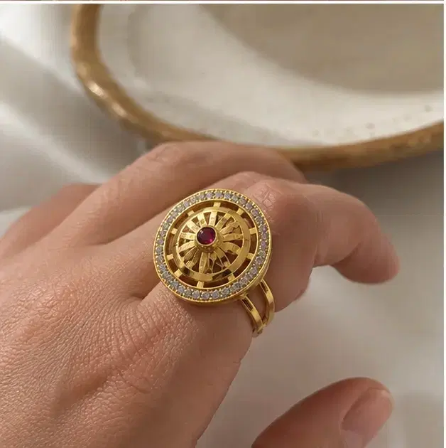 Elegant Gold-Tone Circular Crystal Ring with Red Stone for Women - Image 1