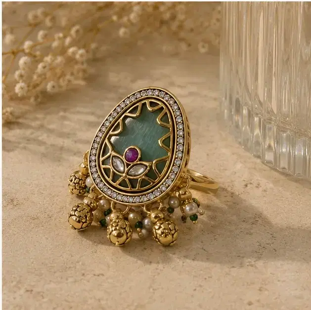 Women’s Gold Tone Oval Green Stone Statement Ring - Image 1