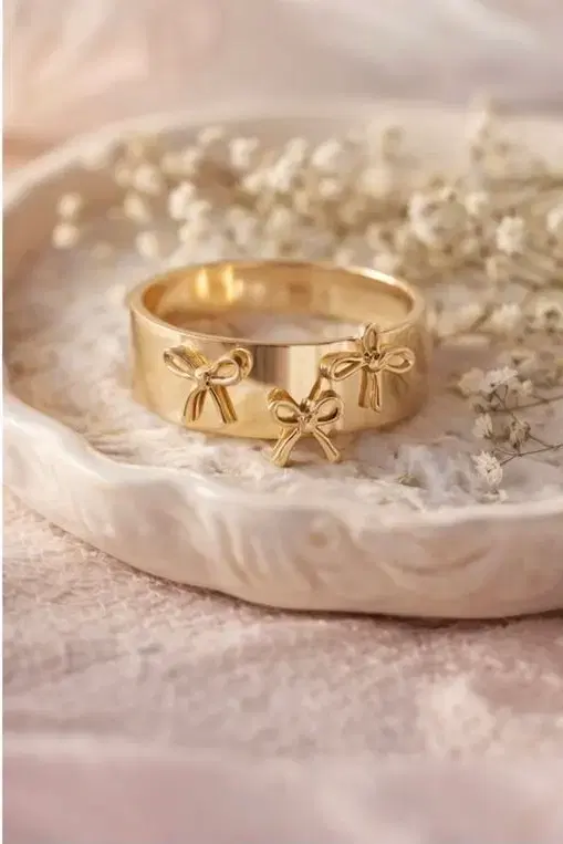 Women's Gold-Tone Bow Design Wide Band Ring - Image 1